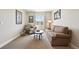 Cozy living room with comfortable seating, natural light, and tasteful decor at 6980 S Yantley Ct, Aurora, CO 80016