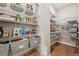 Organized pantry with wire shelving and storage baskets at 6980 S Yantley Ct, Aurora, CO 80016