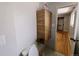 Modern bathroom features wooden cabinet for storage, perfect for keeping essentials organized and easily accessible at 7409 Pierce St, Arvada, CO 80003