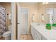 Bathroom with ceramic tile flooring, modern fixtures, and a separate water closet at 10831 Eagle Crest Ln, Parker, CO 80138