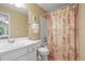 Bathroom with a vanity and a shower featuring a floral shower curtain at 10831 Eagle Crest Ln, Parker, CO 80138