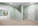 Spacious hallway with stairway and two doorways leading to adjacent rooms at 10831 Eagle Crest Ln, Parker, CO 80138