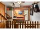 Organized garage workshop with a workbench, storage, and access to the backyard at 930 W Dry Creek Rd, Littleton, CO 80120