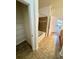 Bathroom featuring separate tub, tile floor, and a storage closet at 17346 Nature Walk Trail Trl # 105, Parker, CO 80134