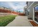 Private backyard with patio and grass at 2389 Quartz St, Castle Rock, CO 80109
