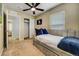 Well-lit bedroom featuring a daybed and built-in closet at 2389 Quartz St, Castle Rock, CO 80109
