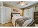 Comfortable bedroom with a full-size bed and updated decor at 2389 Quartz St, Castle Rock, CO 80109
