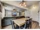 Dining area with a view to kitchen and living room at 2389 Quartz St, Castle Rock, CO 80109