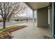 Covered front porch with a view of the quiet street at 2389 Quartz St, Castle Rock, CO 80109
