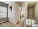 Upper hallway with carpet and access to bedroom and stairs at 2389 Quartz St, Castle Rock, CO 80109