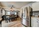 Modern kitchen with stainless steel refrigerator and open layout at 2389 Quartz St, Castle Rock, CO 80109