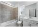 Bathroom featuring a bathtub and shower combination, and a vanity with white cabinets at 39732 Penn Rd, Elizabeth, CO 80107