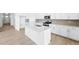 Beautiful kitchen featuring a spacious island, modern appliances, and stylish finishes at 39732 Penn Rd, Elizabeth, CO 80107