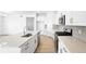 Kitchen boasts modern appliances, sleek countertops, and a large island for meal preparation at 39732 Penn Rd, Elizabeth, CO 80107