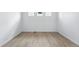 Empty living room with hardwood floors at 39732 Penn Rd, Elizabeth, CO 80107
