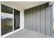 Covered patio with sliding glass door offers an outdoor living space at 39732 Penn Rd, Elizabeth, CO 80107