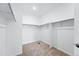 Walk-in closet with carpet flooring and ample storage and shelving space at 39732 Penn Rd, Elizabeth, CO 80107