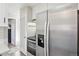 Stainless steel appliances and modern cabinetry in this kitchen at 755 Kenton St, Aurora, CO 80010