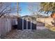 Black storage shed in the backyard at 755 Kenton St, Aurora, CO 80010