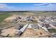 Aerial neighborhood view featuring a two-story home with a sizable backyard and well-maintained landscaping at 4532 Dewey Ln, Brighton, CO 80603