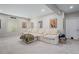 Basement with oversized sectional sofa perfect for movie nights, carpet flooring, and movie-themed decor at 4532 Dewey Ln, Brighton, CO 80603