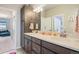 This bathroom features a dual sink vanity with ample counter space at 4532 Dewey Ln, Brighton, CO 80603