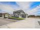 Beautiful two-story home with a well-manicured lawn, three-car garage, and charming curb appeal at 4532 Dewey Ln, Brighton, CO 80603