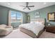 Spacious main bedroom with a large window provides ample natural light at 4532 Dewey Ln, Brighton, CO 80603