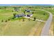 Expansive property featuring a well-maintained home with a detached garage and long driveway at 3047 Deer Creek Ranch Loop, Parker, CO 80138