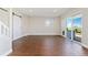 Spacious, bright, finished basement with wood-look tile and walk-out access at 3047 Deer Creek Ranch Loop, Parker, CO 80138