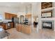 Well-equipped kitchen with granite countertops, stainless steel appliances, and a central island at 3047 Deer Creek Ranch Loop, Parker, CO 80138