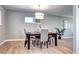Dining room boasts hardwood floors, a neutral color palette and is flooded with natural light at 507 S Pontiac Way, Denver, CO 80224