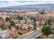 Picturesque aerial view of charming townhomes with mature trees and stunning mountain backdrop at 1276 Harrison Ct, Boulder, CO 80303