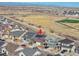 A lovely neighborhood view showcasing a home with solar panels on the roof at 18101 E 44Th Pl, Denver, CO 80249