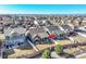 Aerial view of the property highlighting the backyard, patio, and proximity to neighboring homes at 18101 E 44Th Pl, Denver, CO 80249