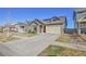 Attractive home with two car garage and neutral exterior paint scheme at 18101 E 44Th Pl, Denver, CO 80249