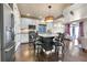 Modern kitchen with a center island and stainless steel appliances at 18101 E 44Th Pl, Denver, CO 80249
