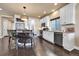 Stylish kitchen featuring granite countertops, island seating and stainless appliances at 18101 E 44Th Pl, Denver, CO 80249