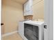 Laundry room with white washer and dryer at 18101 E 44Th Pl, Denver, CO 80249