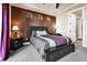 Inviting main bedroom featuring carpet, with a stylish accent wall at 18101 E 44Th Pl, Denver, CO 80249