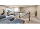 Spacious recreation room with exercise equipment and bright natural light at 18101 E 44Th Pl, Denver, CO 80249