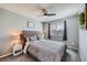 Calming bedroom featuring soft gray tones, carpeted floors, and a window bringing in natural light at 398 Benton St, Castle Rock, CO 80104
