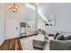 Bright living room with high ceilings, lots of natural light, and neutral decor at 398 Benton St, Castle Rock, CO 80104