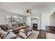 Cozy living room with a fireplace, comfortable seating, and natural light at 398 Benton St, Castle Rock, CO 80104