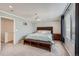 Spacious main bedroom with large window, carpeted floor, and ceiling fan at 398 Benton St, Castle Rock, CO 80104