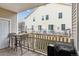 Relaxing covered patio with outdoor seating and a Traeger grill, perfect for entertaining and leisure at 4733 Flower St, Wheat Ridge, CO 80033