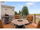Outdoor living with built-in grill and seating area at 6662 Fonder Dr, Parker, CO 80134