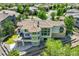 Aerial view of the home showcasing its tile roof and verdant landscaping at 24031 E Hinsdale Pl, Aurora, CO 80016