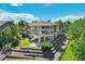 Lush backyard with tiered landscaping and a covered patio at 24031 E Hinsdale Pl, Aurora, CO 80016