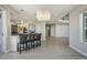Spacious open concept kitchen with stainless steel appliances and bar stool seating at 24031 E Hinsdale Pl, Aurora, CO 80016